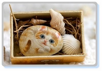 Рисунки кошек на камнях 10